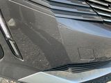 a close up of a car ' s front bumper