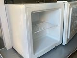 two microwaves sitting on top of a counter in a kitchen