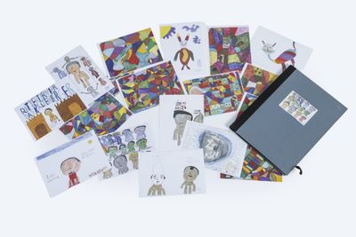 a bunch of cards with pictures of people and animals on them