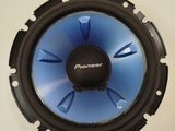 a close up of a speaker with a blue light in it
