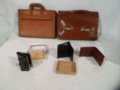 four pieces of luggage sitting next to each other on a white surface
