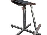 an image of a metal stool with a wooden seat on a white background