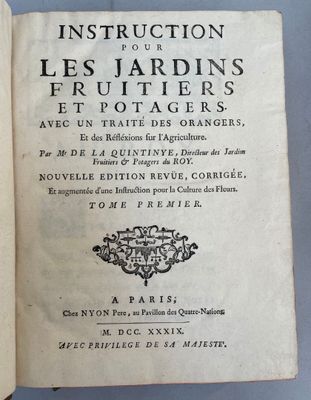an open book with a picture of the title of a garden