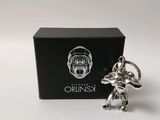 an image of a silver figurine of a man holding a sword