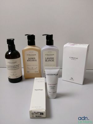 several different types of skin care products sitting on a table