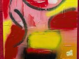 un tableau posé sur un chevalet, avec un fond rouge et jaune