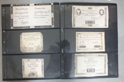 six types différents de billets de banque sont empilés les uns sur les autres