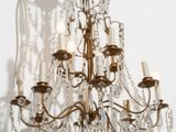a large chandelier with many lights hanging from it