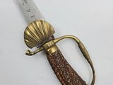 a knife that is laying on top of a table