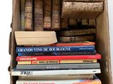 a box full of books on a white background