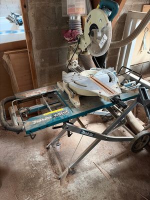 a picture of a table with a saw on it