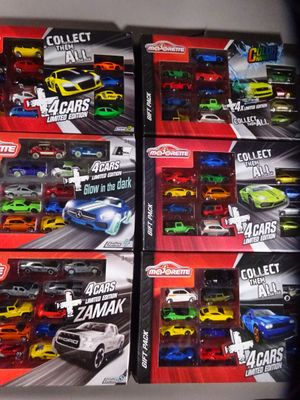 a lot of toy cars that are in the box