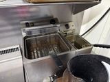 an image of a commercial fryer in a commercial kitchen