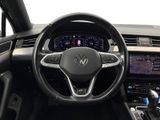 the interior of a car with a steering wheel and dashboard controls