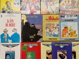 a lot of books that are on the table