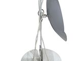 a small table with a lamp on top of it