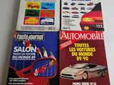 three magazine covers of different cars on a white surface