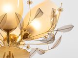 chandelier in the shape of a flower with glass petals and leaves