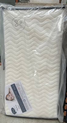 a mattress that is sitting on the floor in a store