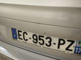 a close up of a license plate on a car