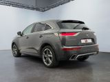 the rear end of a grey 2020 infiniti suv