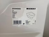a close up of a white toilet with a label on it