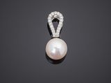 a cultured pearl and diamond pendant