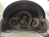 a close up of a car dashboard with a speedometer and gauges