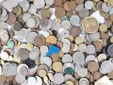 a lot of coins that are on the ground