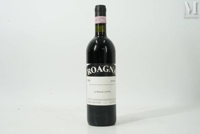 a bottle of wine that is sitting on a table