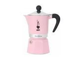 a pink stove top coffee maker sitting on top of a white table