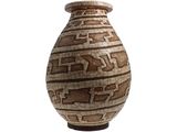 a vase that has a pattern on it on a white background