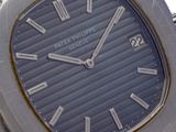 an image of a close up of a wrist watch with roman numerals