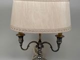 an image of a lamp with a white shade on top of it