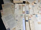 a pile of old letters and envelopes on a table