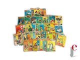 une pile de livres pour enfants posée sur une surface blanche