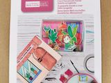 a close up of a picture of a craft kit on a table
