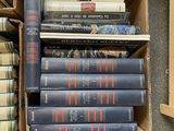 a box full of books sitting on the floor
