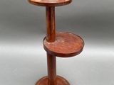 an image of a wooden table with two tiers on it