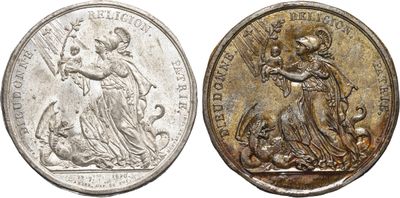 a silver coin with an image of a woman holding a child