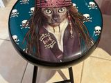 pirate themed stool with a painting of a dog wearing a bandana
