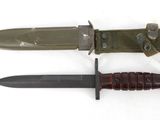 a knife and a knife sheath on a white surface
