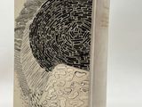an image of a book with a drawing of a tree in the middle of it