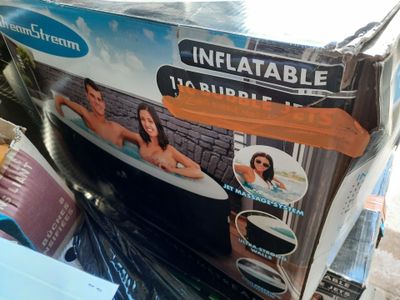 a box of inflatable bathtubs sitting on a table