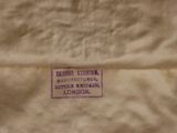 a close up of a piece of cloth with a label on it