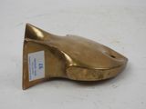 an image of a gold fish figurine on a white surface