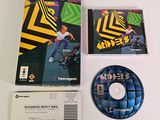 the cd is sitting on the table next to the cd case