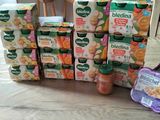 many boxes of yogurt and yogurts on the table