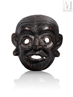 une image d'un masque en bois sur fond blanc