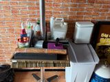 an image of a kitchen area with a table and appliances